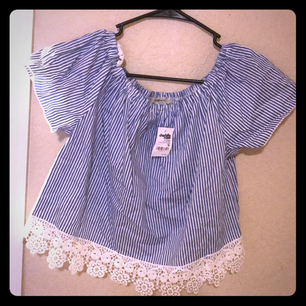 Over the shoulder flowered top.